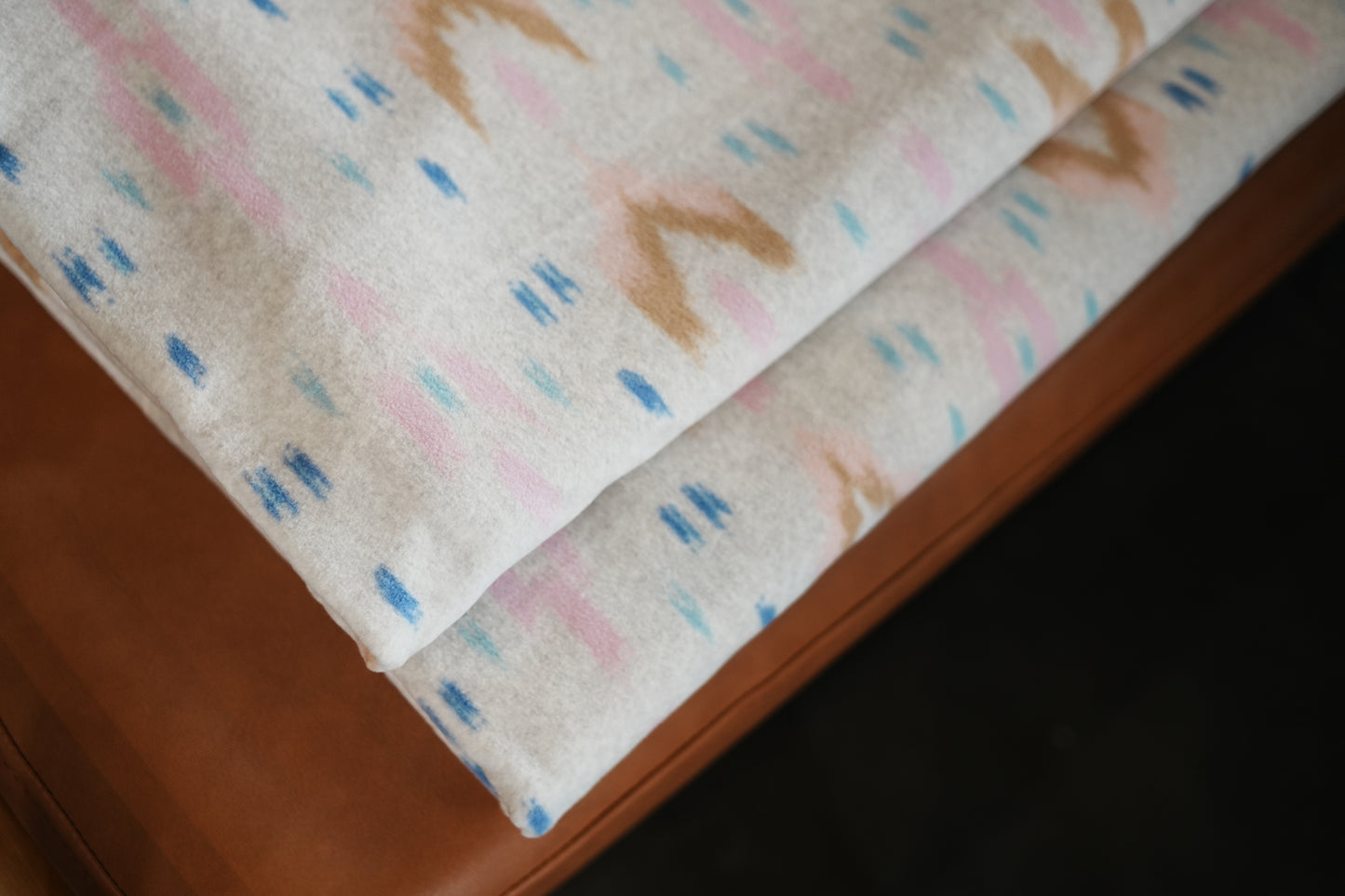 M-shaped leather brocade