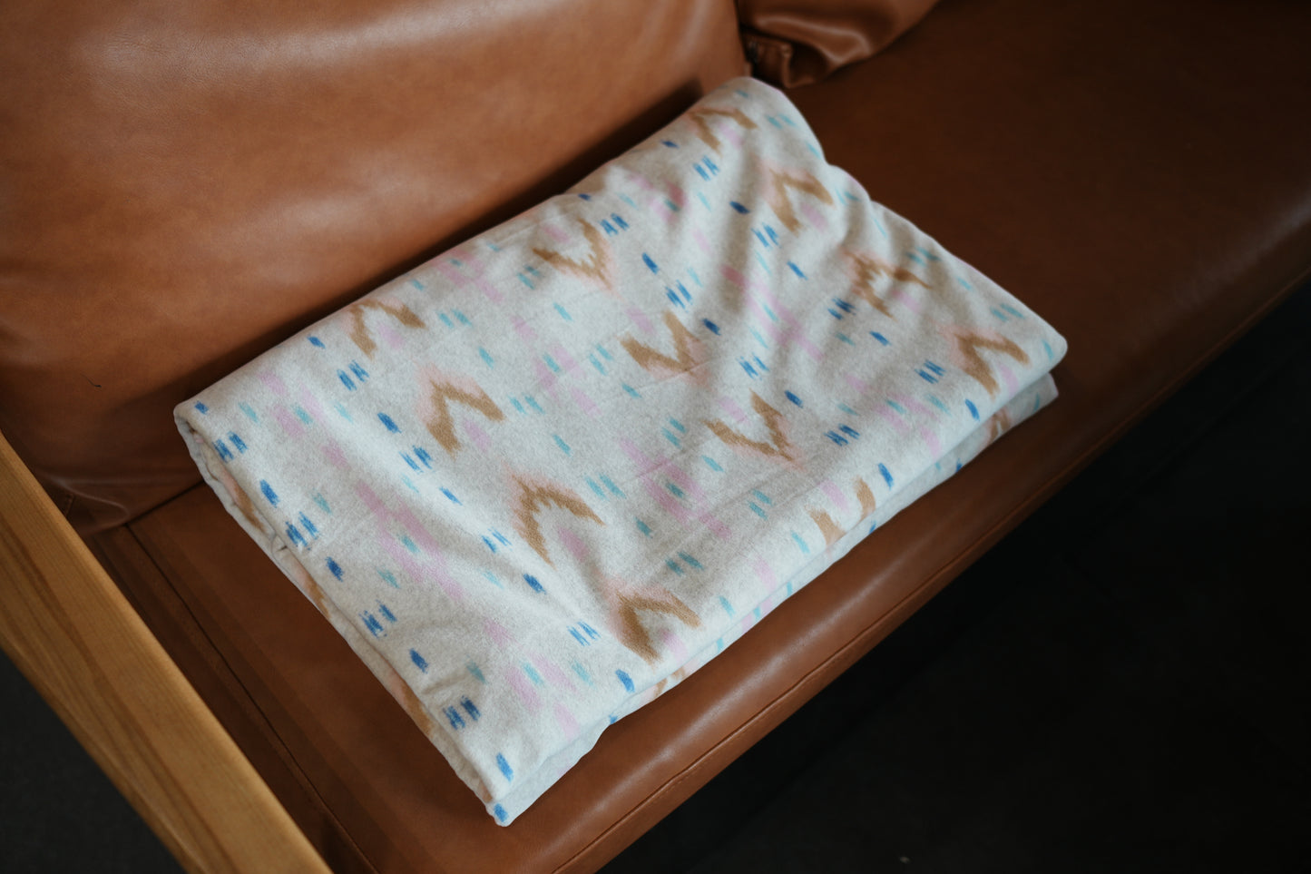M-shaped leather brocade